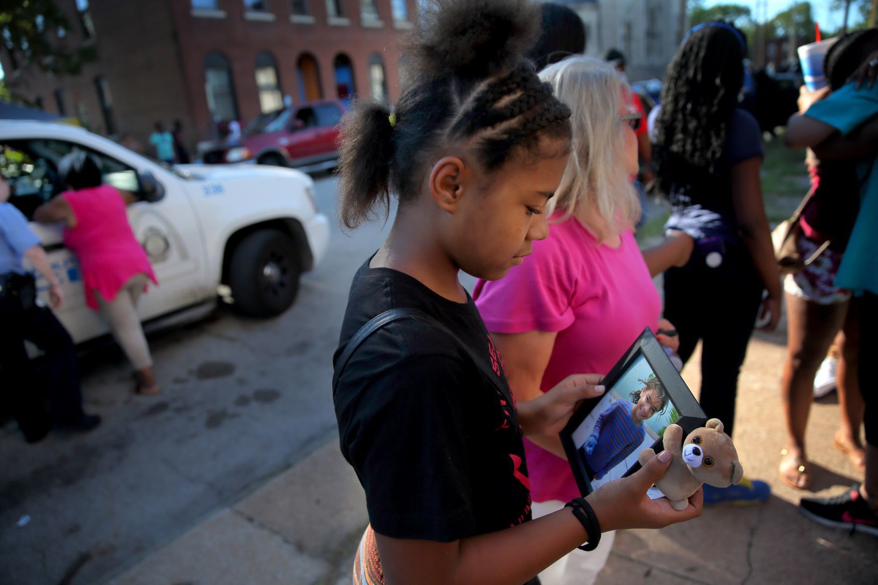 Vigil for 7-year-old Xavier Usanga killed by stray bullet in St. Louis